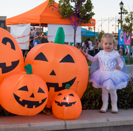 girl with pumpkins at howl